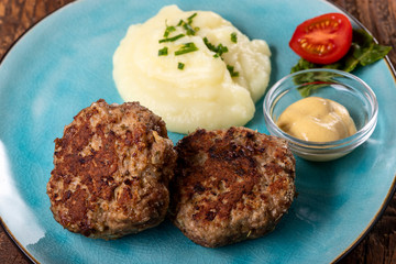 two bavarian meat loafs on a plate