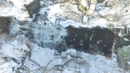 Wall Mural - aerial view of waterfall in winter