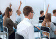 © ASDF - diverse young people applauding while sitting in the same row