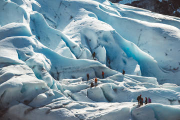 Private group of hiker walking on glacier. Glacier group of people hiking mountains