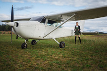Young Girl With Small White Aircraft