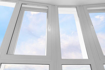 Large white plastic window against blue sky