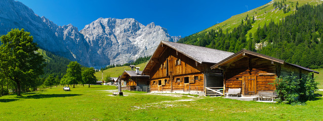 Poster - panorama landscape in bavaria with wooden old farmhouse