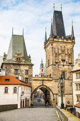 Prague, Czech republic - March 19, 2020. Malostranska mostecka tower as a beginning/end of Charles Bridge 