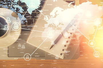 Double exposure of social network theme drawing and work table top veiw. Concept of international connection.