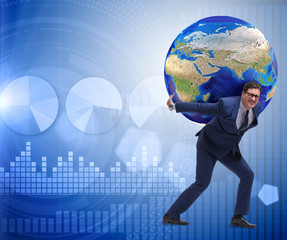 Wall Mural - Businessman carrying Earth on his shoulders