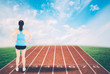 © NT_studio - Back young asian woman start a run with track and nature background, girl runner ready to target success, healthy and care, exercise and workout, activity for wellness and lifestyle concept.
