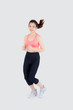 © NT_studio - Beautiful young asian woman happy and smiling jogging isolated on white background, asia girl cheerful in sport is activity exercise cardio and workout with running for healthy, health concept.