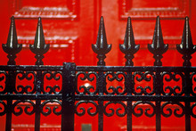 Detail Of Wrought Iron Gate And Red Door Of Boarding School, New York City, NY