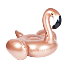 Rose Gold Inflatable Flamingo Swimming Pool Float Isolated On White Background. Water Donut. Toroid-Shaped Tube. Ride On Beach Toy. Luxury Pink Baby Swim Ring