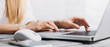 Woman hands typing on computer keyboard closeup, businesswoman or student using laptop panoramic banner, online learning, internet marketing and freelance work concept 