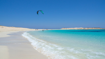 Marsa Matruh, Egypt. The sandy beach and the amazing sea with tropical blue, turquoise and green colors. Relaxing context. Fabulous holidays. Mediterranean Sea. North Africa. Clean and pristine sea