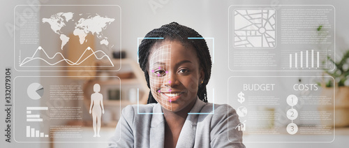 Fotomural Face scanning of African American businesswoman in defocused office with double