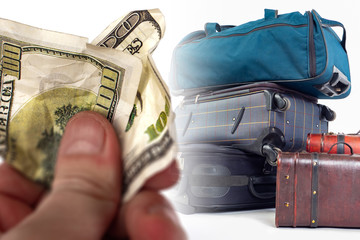 Poster - a crumpled hundred-dollar bill in his hand against the background of many suitcases. payment for tra