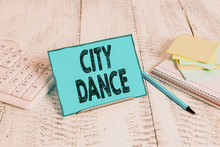 Word Writing Text City Dance. Business Photo Showcasing Activity Of Dancing For Pleasure Or In Order To Entertain Others Notepaper Stand On Buffer Wire In Between Computer Keyboard And Math Sheets
