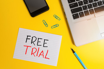 Aufkleber - Writing note showing Free Trial. Business concept for Product or service offered for no cost to try and give feedback Trendy laptop smartphone marker paper sheet clips colored background