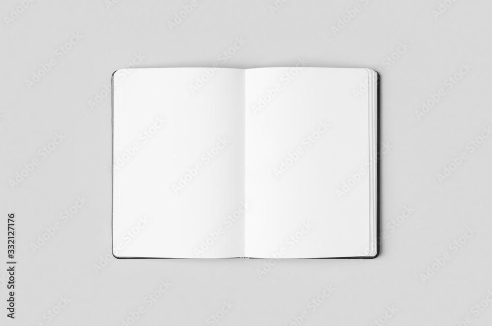 Notebook inside mockup on a grey background. Stock Photo | Adobe Stock