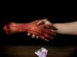 hand in blood handshake