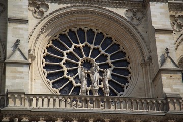 Wall Mural - Big glass window and sculptures of Notre Dame de Paris, France