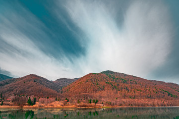 Wall Mural - the mountain autumn landscape with colorful forest
