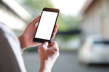 cropped shot view of man hands holding smart phone with blank copy space screen for your text messag