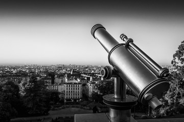 Telescope, view from Montmartre Hill overlooking the rooftops, Paris, France