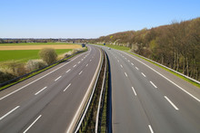 Corona Virus Crisis Stay At Home And Curfew Concept: No Traffic On Deserted Empty German Highway A61 Between Germany And Netherlands