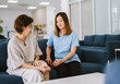 © Near - Young doctor consulting senior patient at health care clinic