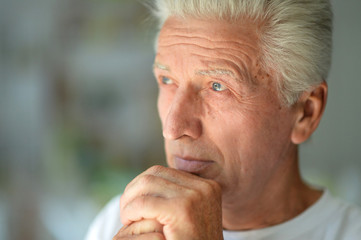 Poster - Close up portrait of thoughtful senior man