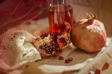 Pomegranate and pomegranate juice. Pomegranate still life