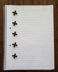 Notebook. Things to do. Blank page with brown crosses.