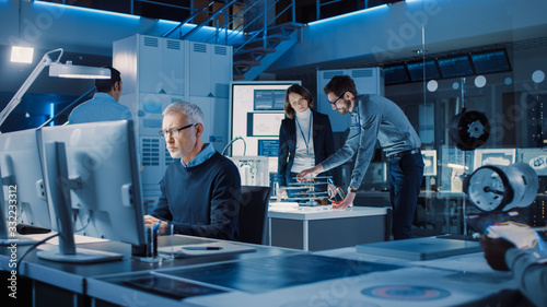 Fotomural Diverse International Team of Industrial Engineers and Scientists Working in Research Laboratory and Development Center