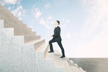 Aufkleber - Young businessman climbing abstract stairs