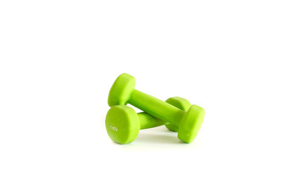 two dumbbells for fitness green. weight is 1 kg.