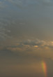Mini rainbow in a stormy Oklahoma sky.
