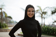 © Odua Images - beautiful sport muslim woman smiling. healthy woman with scarf exercising