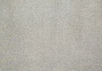 Grey textile fabric background closeup