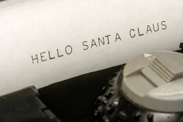Wall Mural - Close up printed text Hallo Santa Claus on an old typewriter