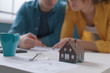 © stokkete - Young couple working on their house project together