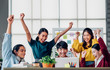 © weedezign - Asian ux developer and ui designer arms raise for successful design at modern office.Creative digital development agency