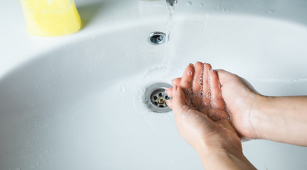 woman washing hands