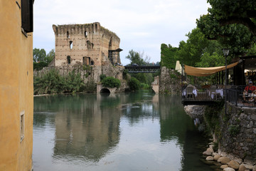 Wall Mural - Borghetto (VR),  Italy - April 30, 2017: Mincio river in Borghetto village, Mincio, Verona, Veneto, Italy