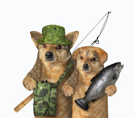 Canvas Print - Two dogs are fishers. One of them holds a caught fish, the other with a fishing bag and a fishing rod. White background. Isolated.