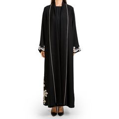 Wall Mural - Arabic Muslim woman in a stylish abaya, in white background - Image
