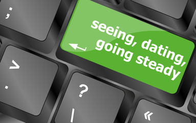Poster - modern keyboard with seeing, dating, going, steady text symbols
