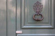 door with knocker in paris (france)