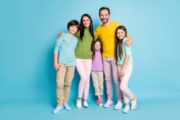 Canvas Print - Full length body size view of nice attractive lovely charming ideal cheerful cheery family pre-teen kids mom dad embracing isolated on bright vivid shine vibrant blue color background