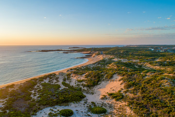 Aerial view of ocean coastline at sunset near Beachport, South Australia