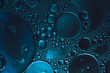 dark blue abstract background, bubbles in transparent liquid