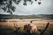 Vintage Colored Photo. Table Prepared For Lunch In Autumn Nature, Picnic